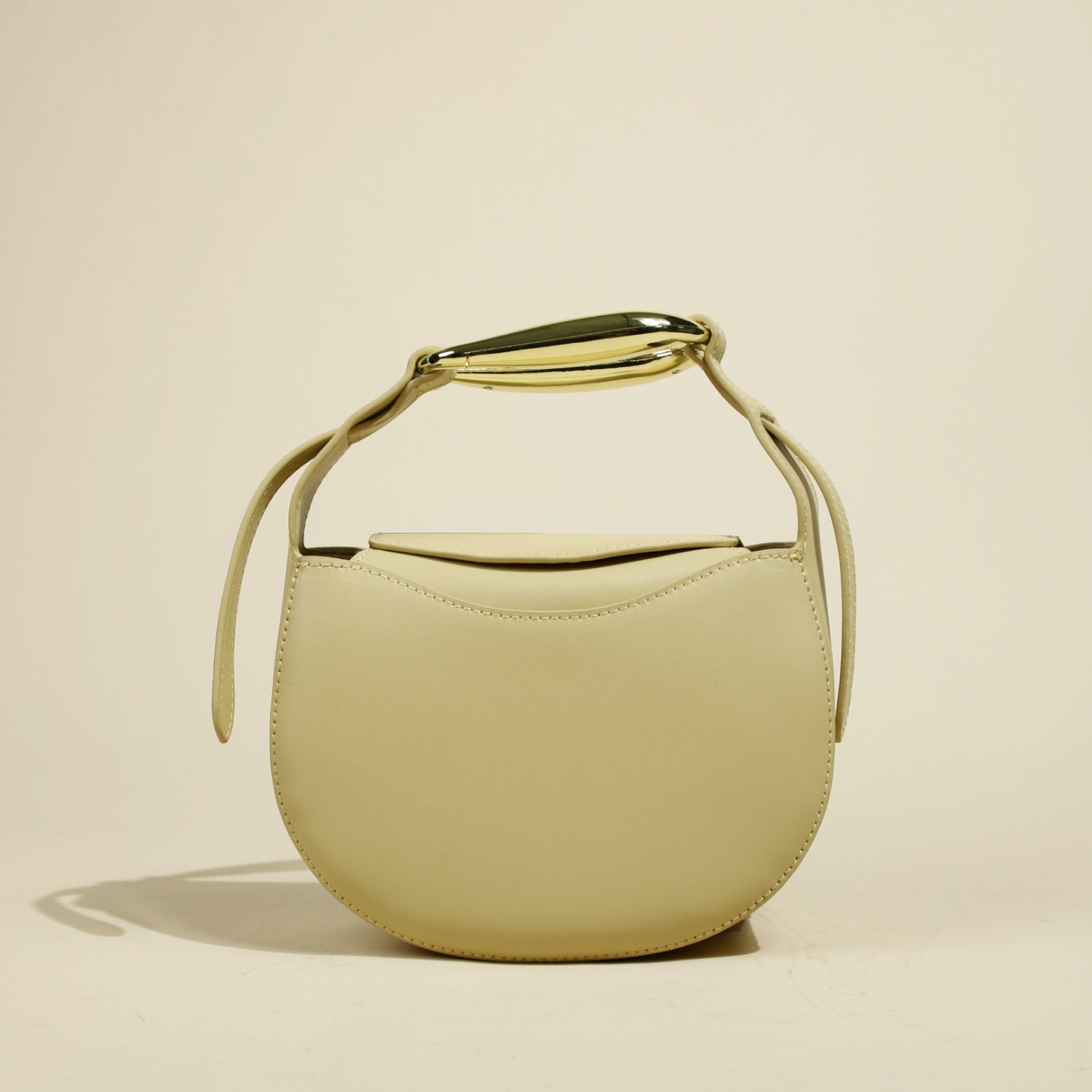 Mini Bag Tonda Western Style – Tracolla Elegante con Manico Dorato