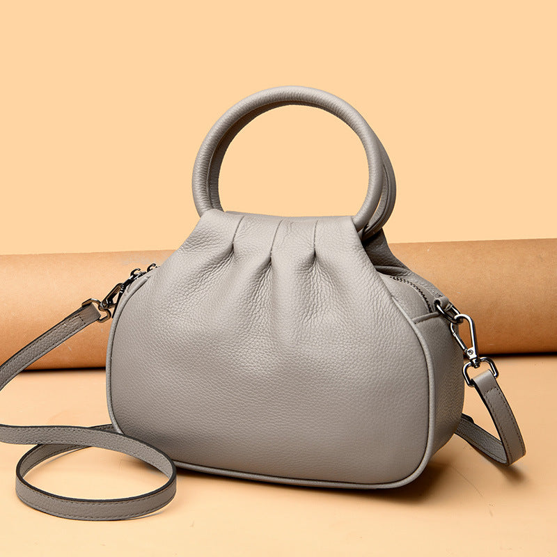 Elegante borsa da donna color grigio elefante, versatile e adatta anche a tracolla