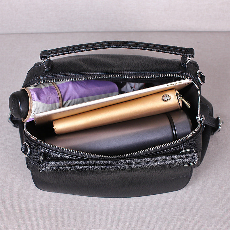 Borsa a tracolla vintage realizzata in morbida pelle bovina pieno fiore.