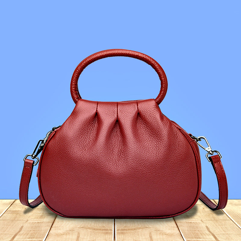 Elegante borsa da donna color grigio elefante, versatile e adatta anche a tracolla