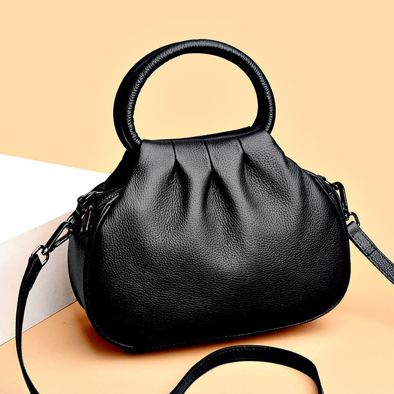 Elegante borsa da donna color grigio elefante, versatile e adatta anche a tracolla