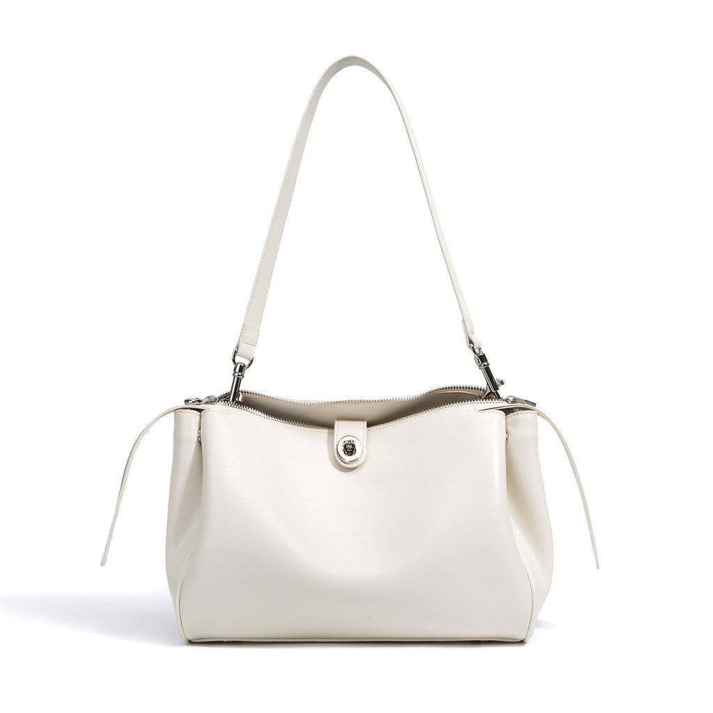 Elegante borsa a tracolla in vera pelle, in stile western