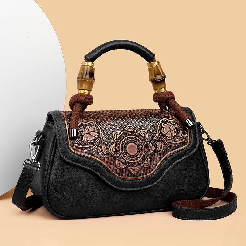 Borsa a tracolla retrò realizzata a mano in pelle con lavorazione a rilievo