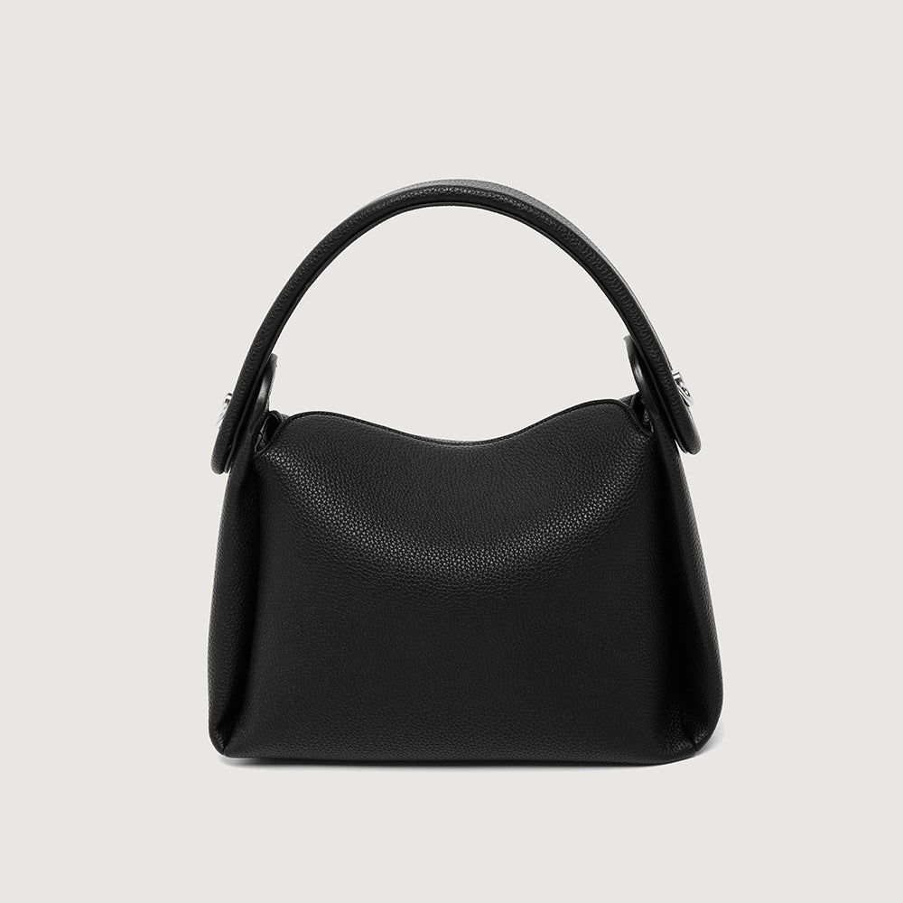 Borsa a tracolla minimalista e versatile in vera pelle